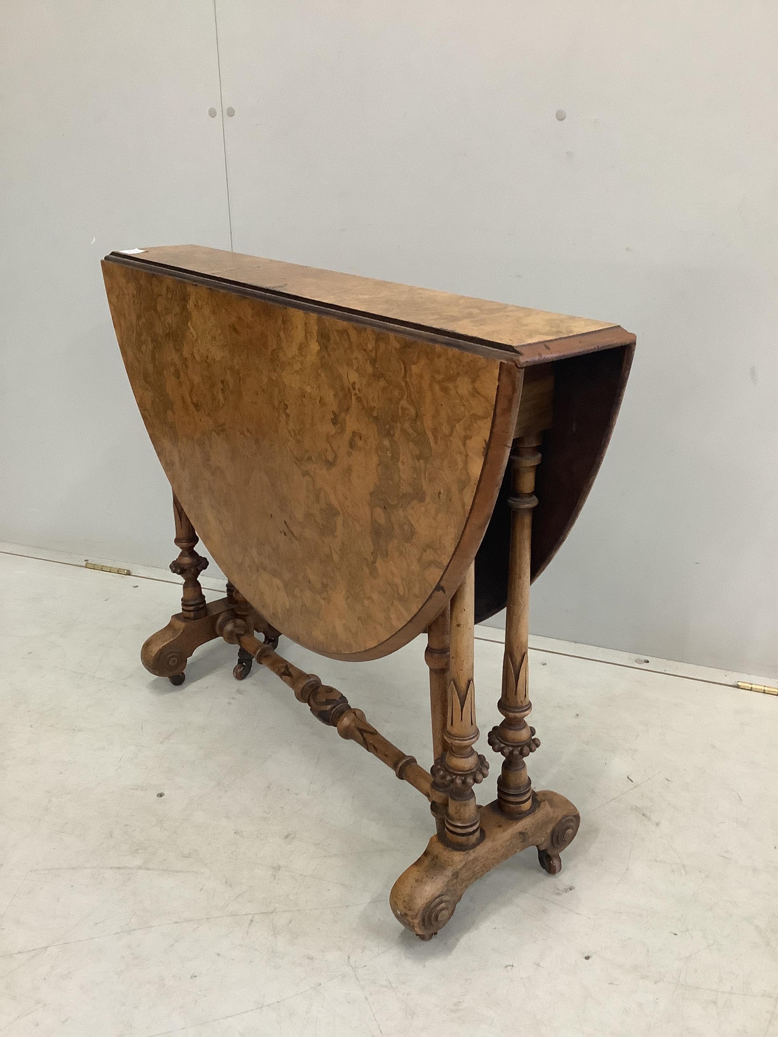 A Victorian burr walnut Sutherland table, width 90cm, height 71cm. Condition - fair